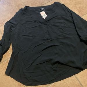Black blouse no stretch. Brand new with tags.